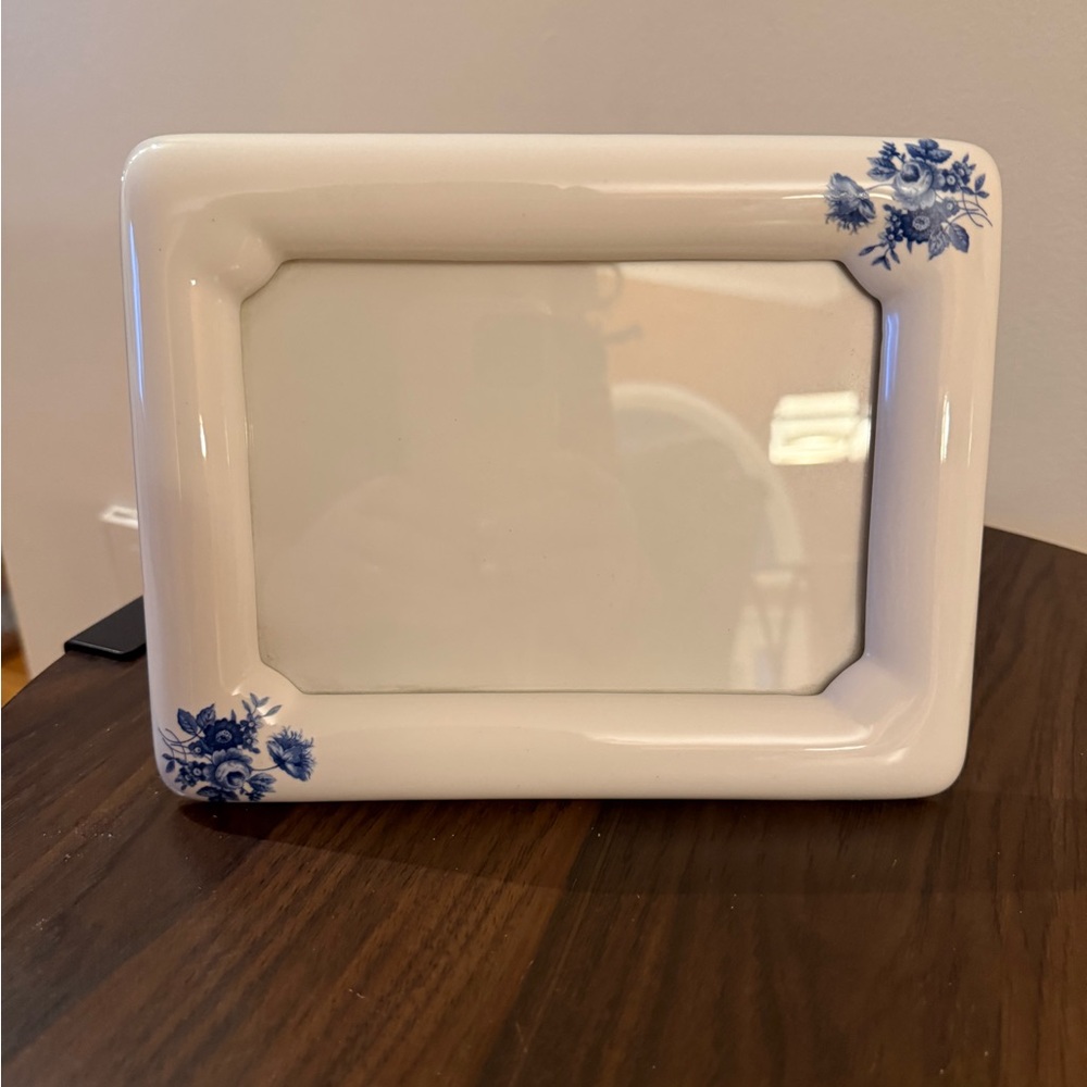 White Frame with Blue Floral Accents